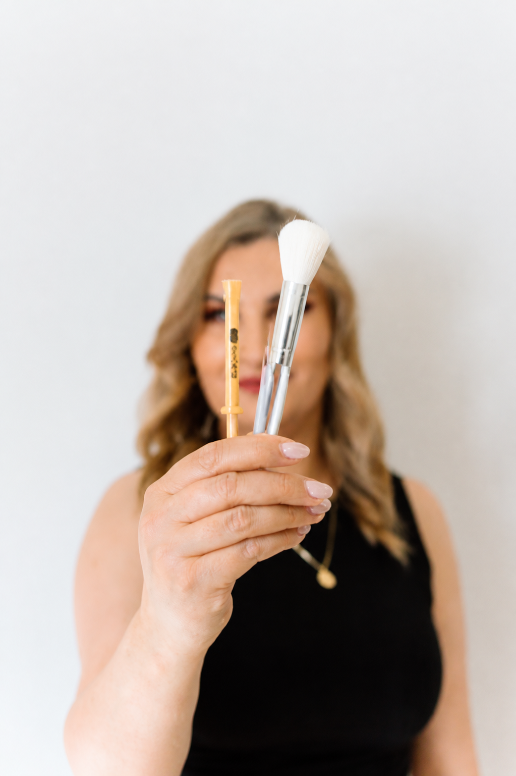 Masoda holding professional treatment brushes